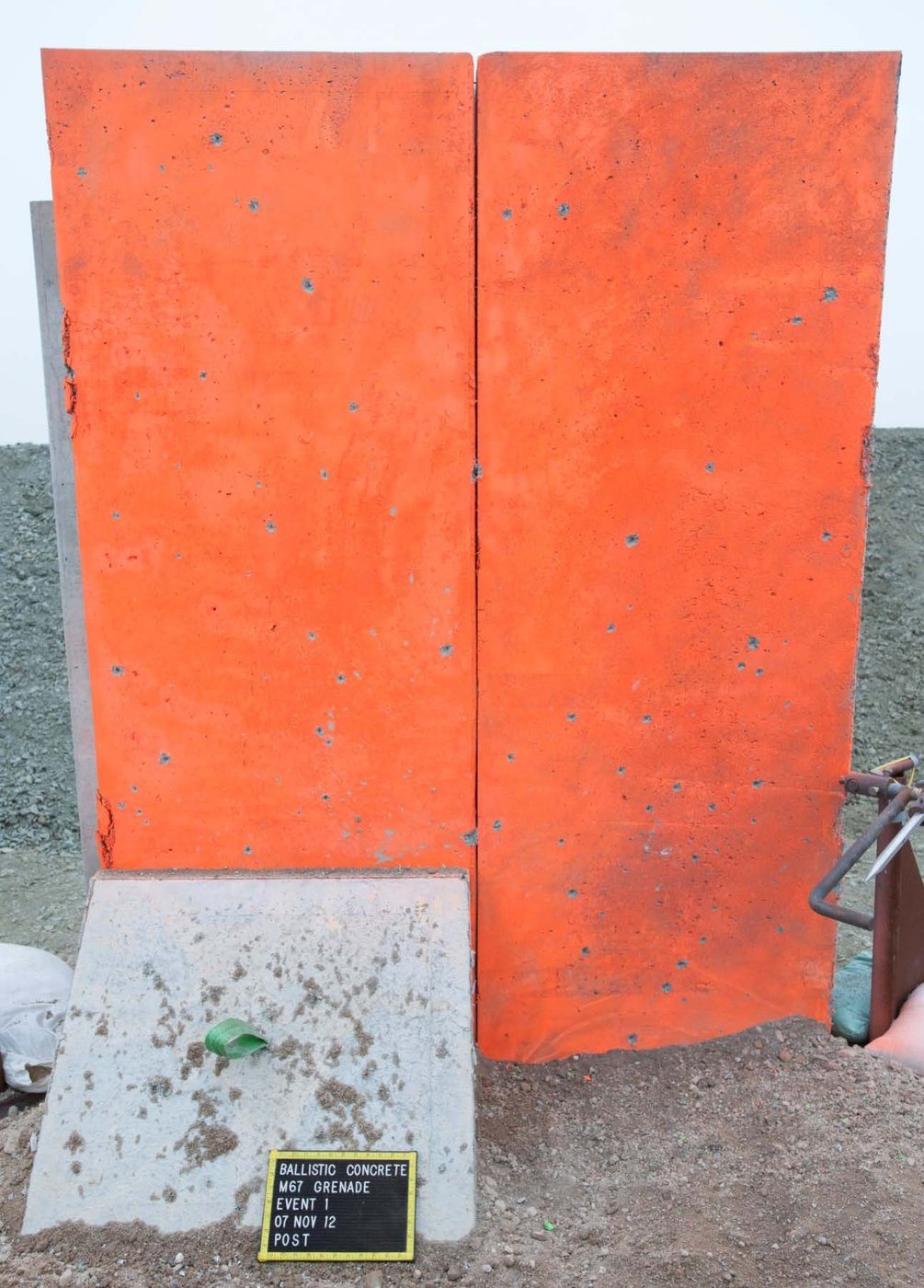 An ABC wall panel after a direct M67 fragmentation grenade detonation at a 5-foot standoff