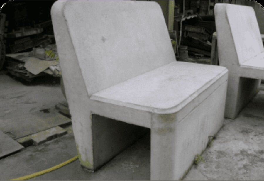 Amidon Ballistic Concrete bench designed to double as ballistic cover.