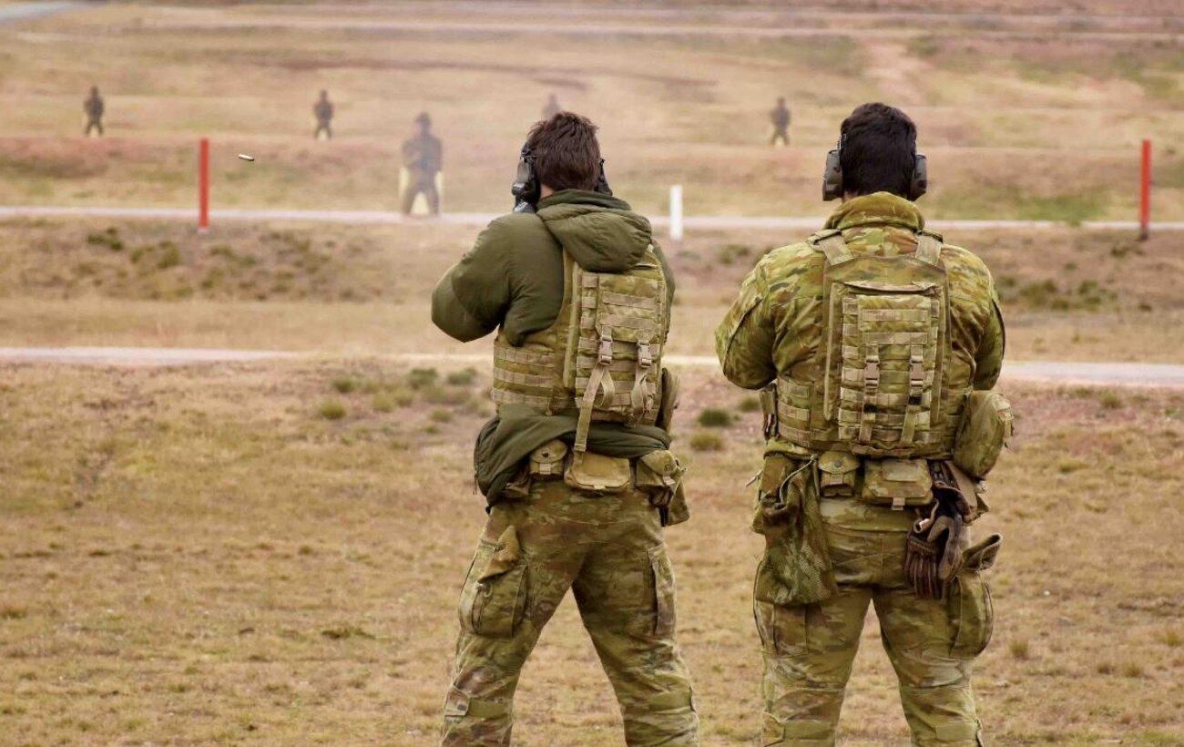 Military personnel conducting range training
