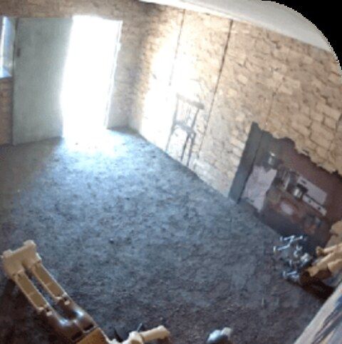 Interior of an Amidon shoot house showing block walls and a concrete floor ready for training scenario setup